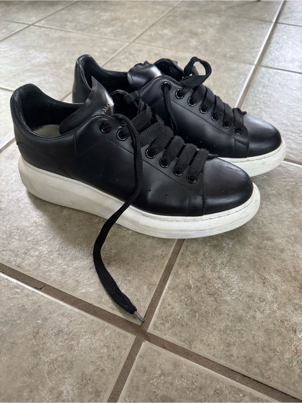Women’s Alexander McQueen black leather oversized sneaker